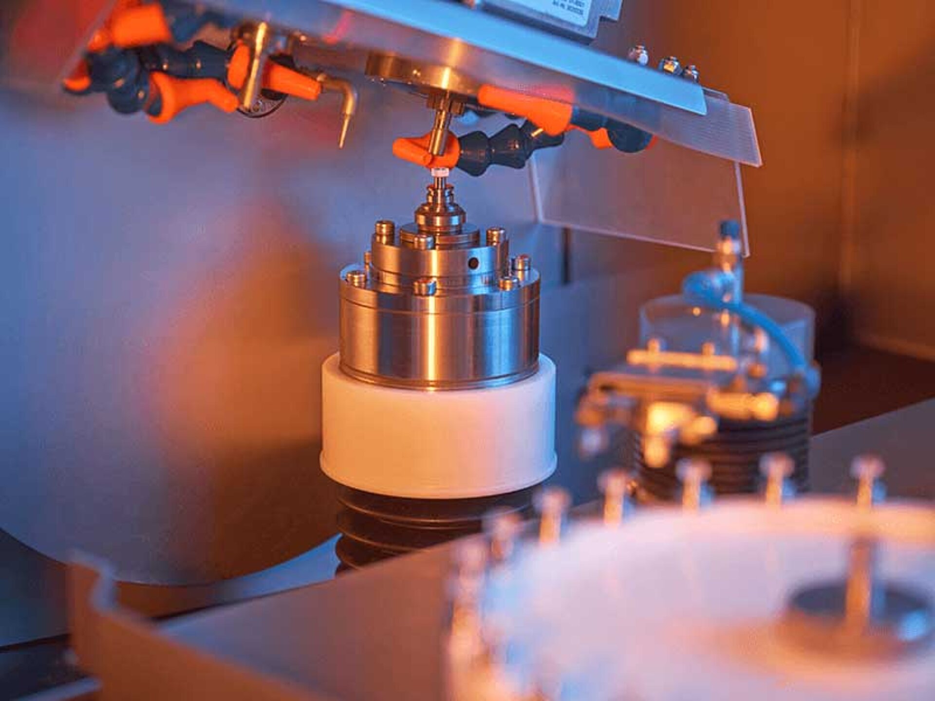 Close-up of industrial machine with rotating components and precision tools