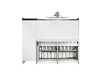 Large semiconductor processing machine with multiple internal tanks visible through the lower section.