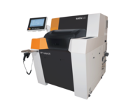 Automated industrial machine with side touchscreen control monitor for precise manufacturing processes.