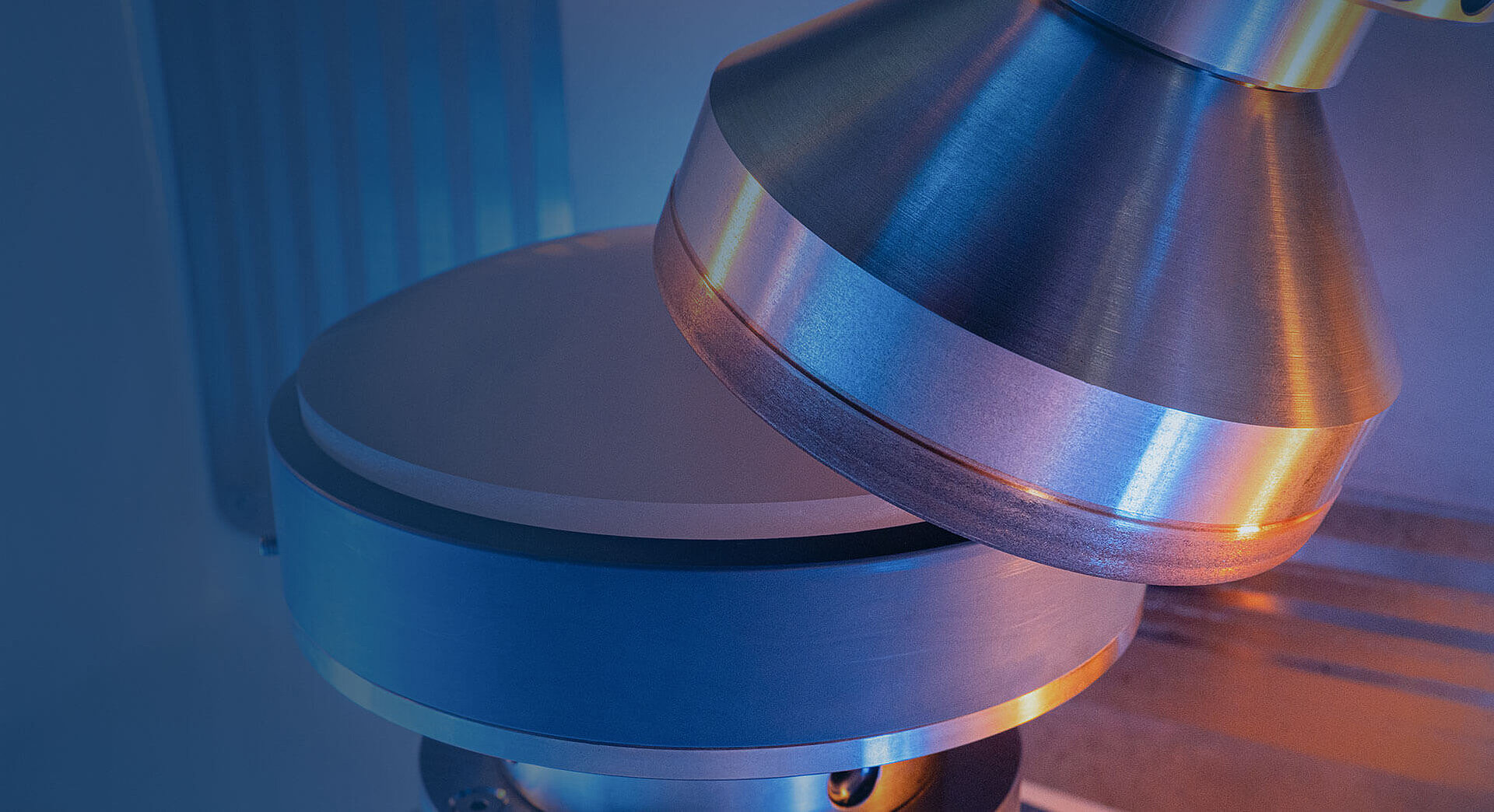 Grinding process on Satisloh SPM-150 precision optics machine.