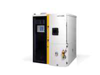 Industrial vacuum coating machine with touchscreen control panel, used for optical lens production.