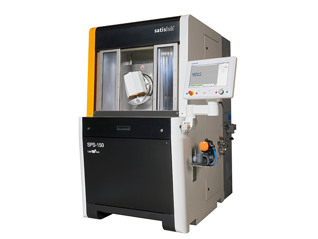 Modern industrial laboratory machine with enclosed chamber and touchscreen control panel.
